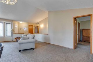 Photo 5: 104 Arbour Cliff Close NW in Calgary: Arbour Lake Semi Detached (Half Duplex) for sale : MLS®# A2069139