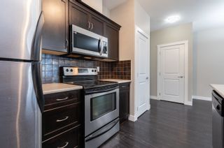 Photo 15: 406 2038 SANDALWOOD Crescent in Abbotsford: Central Abbotsford Condo for sale in "Element" : MLS®# R2880696