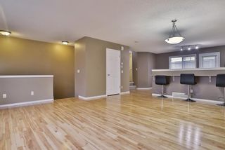 Photo 8: 59 Tuscany Springs Gardens NW in Calgary: Tuscany Row/Townhouse for sale : MLS®# A2003672