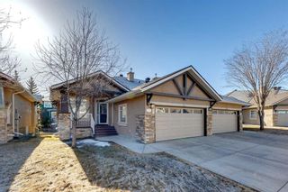 Main Photo: 77 Discovery Woods Villas SW in Calgary: Discovery Ridge Semi Detached (Half Duplex) for sale : MLS®# A2118414