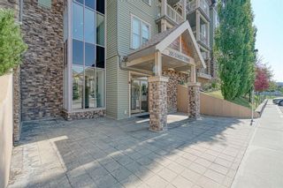 Photo 3: 104 205 Sunset Drive: Cochrane Apartment for sale : MLS®# A1253873