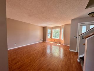 Photo 6: 80 Erin Circle SE in Calgary: Erin Woods Detached for sale : MLS®# A2050333