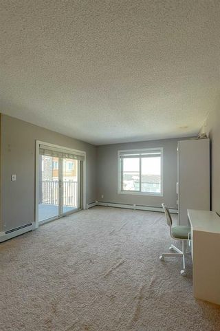 Photo 3: 402 7210 80 Avenue NE in Calgary: Saddle Ridge Apartment for sale : MLS®# A2001799