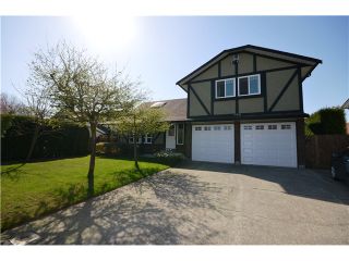 Photo 1: 11991 188A Street in Pitt Meadows: Central Meadows House for sale in "CENTRAL MEADOWS" : MLS®# V998915