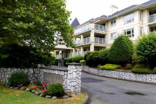 Main Photo: 205 20125 55A Avenue in Langley: Langley City Condo for sale in "BLACKBERRY LANE II" : MLS®# R2490033