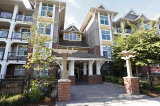 Photo 1: 207 17712 57A Avenue in Surrey: Cloverdale BC Condo for sale in "West On The Village Walk" (Cloverdale)  : MLS®# R2260397
