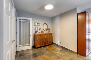 Photo 8: 10611 Willowind Place SE in Calgary: Willow Park Detached for sale : MLS®# A2037448