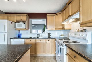 Photo 12: 6 Crystal Shores Cove: Okotoks Row/Townhouse for sale : MLS®# A1080376