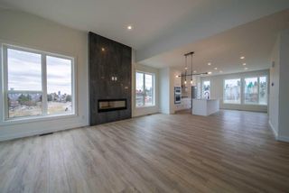Photo 5: 322 Sovereign Common SW in Calgary: Shaganappi Row/Townhouse for sale : MLS®# A2127197