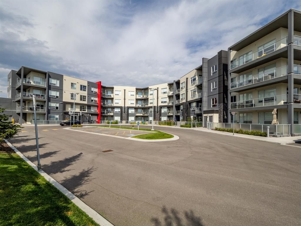 Main Photo: 221 8530 8A Avenue SW in Calgary: West Springs Apartment for sale : MLS®# A1245709