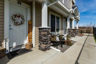 Main Photo: 69 Redstone Circle NE in Calgary: Redstone Row/Townhouse for sale : MLS®# A2132839