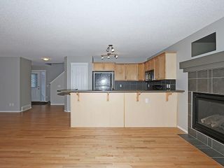 Photo 14: 89 SUNSET Heights: Cochrane House for sale : MLS®# C4177018