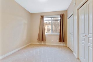 Photo 19: 14 169 Rockyledge View NW in Calgary: Rocky Ridge Row/Townhouse for sale : MLS®# A1159449