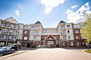 Photo 2: 223 8 Prestwick Pond Terrace SE in Calgary: McKenzie Towne Apartment for sale : MLS®# A2028729