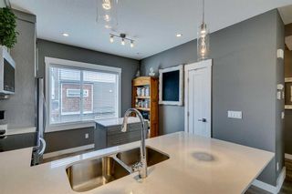 Photo 8: 12 111 Rainbow Falls Gate: Chestermere Row/Townhouse for sale : MLS®# A2105067