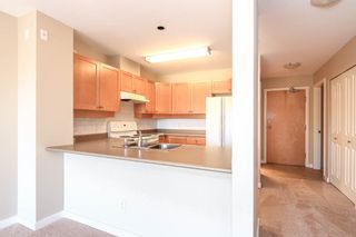 Photo 7: 402 808 SANGSTER Place in New Westminster: The Heights NW Condo for sale in "THE BROCKTON" : MLS®# R2077113