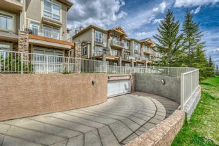 Photo 10: 1 117 Rockyledge View NW in Calgary: Rocky Ridge Row/Townhouse for sale : MLS®# A2137887