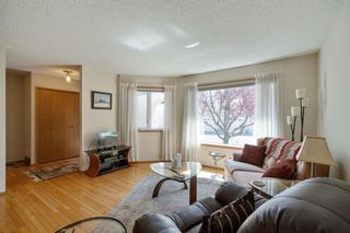 Photo 8: 21 Sandarac Circle NW in Calgary: Sandstone Valley Row/Townhouse for sale : MLS®# A2048786