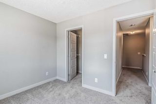 Photo 21: 712 32 red embers parade NE in Calgary: Redstone Row/Townhouse for sale : MLS®# A2060835