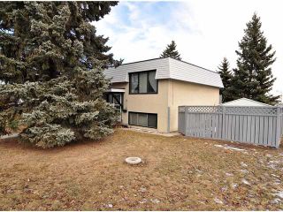 Photo 2: 7802 HUNTERQUAY Road NW in Calgary: Huntington Hills Half Duplex for sale : MLS®# C3650230