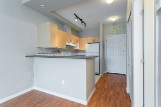 Photo 15: 407 20200 56 Avenue in Langley: Langley City Condo for sale in "The Bentley" : MLS®# R2356698