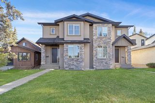 Photo 1: 2016 29 Street SW in Calgary: Killarney/Glengarry Semi Detached (Half Duplex) for sale : MLS®# A1258978