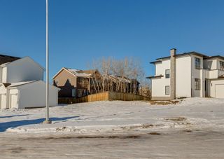Photo 1: 27 ROCKFORD Park NW in Calgary: Rocky Ridge Residential Land for sale : MLS®# A2011889