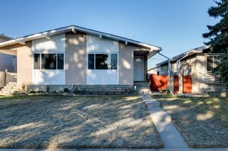 Photo 1: A & B 927 43 Street SW in Calgary: Rosscarrock Duplex for sale : MLS®# A1150334
