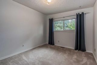 Photo 16: 7006 54 Avenue NW in Calgary: Silver Springs Semi Detached (Half Duplex) for sale : MLS®# A2079697