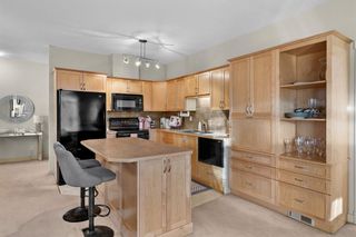 Photo 10: 505 8000 Wentworth Drive SW in Calgary: West Springs Row/Townhouse for sale : MLS®# A2020670
