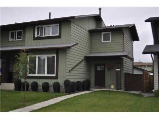 Photo 1: 559 SUMMERWOOD Place SE: Airdrie Residential Attached for sale : MLS®# C3580809