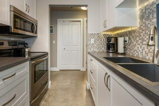 Photo 8: 104 819 4A Street NE in Calgary: Renfrew Apartment for sale : MLS®# A2011293