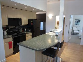 Photo 3: 100 1788 W 13TH Avenue in Vancouver: Fairview VW Condo for sale in "MAGNOLIA" (Vancouver West)  : MLS®# V985193