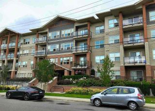 Photo 1: 216 20219 54A Avenue in Langley: Langley City Condo for sale in "SUEDE" : MLS®# R2163721