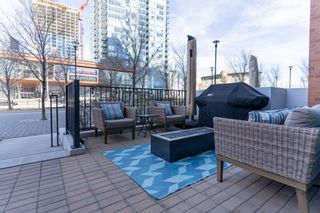 Photo 2: 582 Riverfront Lane SE in Calgary: Downtown East Village Row/Townhouse for sale : MLS®# A2019285