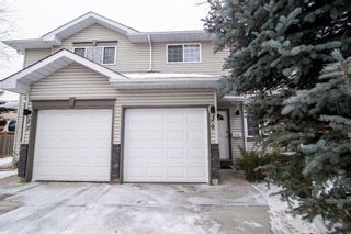 Photo 1: 20 Shawinigan Lane SW in Calgary: Shawnessy Row/Townhouse for sale : MLS®# A1210997