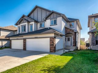Main Photo: 118 BRIDLERANGE Place SW in Calgary: Bridlewood Duplex for sale : MLS®# A1027714