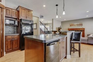 Photo 11: 243 ST MORITZ Drive SW in Calgary: Springbank Hill Detached for sale : MLS®# A1169412