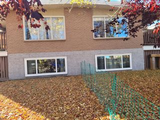 Photo 2: 7403 36 Avenue NW in Calgary: Bowness 4 plex for sale : MLS®# A2023861