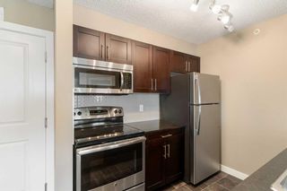 Photo 12: 6406 403 Mackenzie Way SW: Airdrie Apartment for sale : MLS®# A2108233