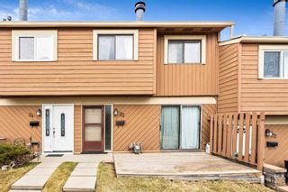 Photo 1: 23 4940 39 Avenue SW in Calgary: Glenbrook Row/Townhouse for sale : MLS®# A1201654