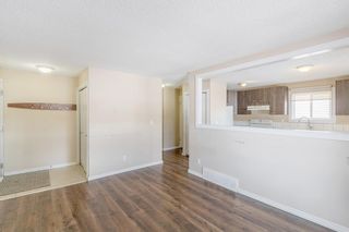 Photo 7: 128 Abbercove Way SE in Calgary: Abbeydale Detached for sale : MLS®# A2024304