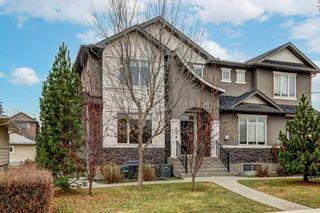 Photo 1: 539 34 Street NW in Calgary: Parkdale Row/Townhouse for sale : MLS®# A2093837