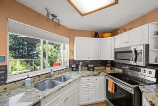 Photo 13: 1243 MILL Street in North Vancouver: Lynn Valley Townhouse for sale in "MILL HOME PLACE" : MLS®# R2793694