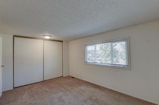 Photo 16: 323 Queenston Heights SE in Calgary: Queensland Row/Townhouse for sale : MLS®# A1203860