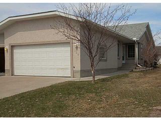 Photo 1: 130 RIVERSIDE Crescent NW: High River Residential Attached for sale : MLS®# C3612435