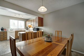 Photo 6: 143 Woodvale Bay SW in Calgary: Woodlands Row/Townhouse for sale : MLS®# A2022754