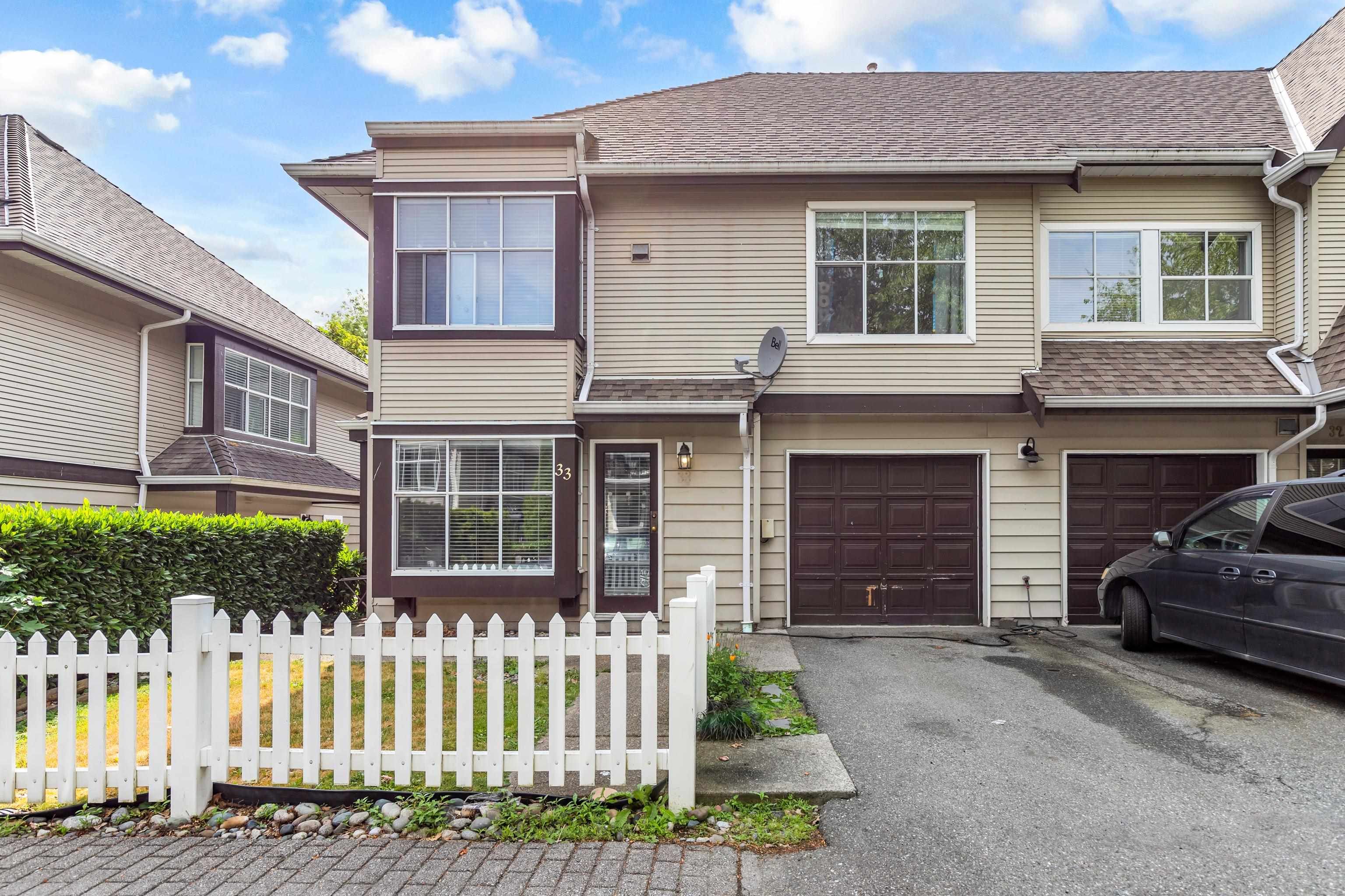 Main Photo: 33 12099 237 Street in Maple Ridge: East Central Townhouse for sale in "Gabriola" : MLS®# R2789104