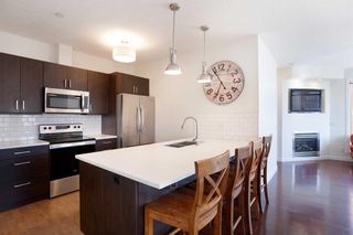 Photo 1: 307 910 18 Avenue SW in Calgary: Lower Mount Royal Apartment for sale : MLS®# A2113208