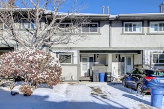 Photo 1: 105 7172 Coach Hill Road SW in Calgary: Coach Hill Row/Townhouse for sale : MLS®# A2011279